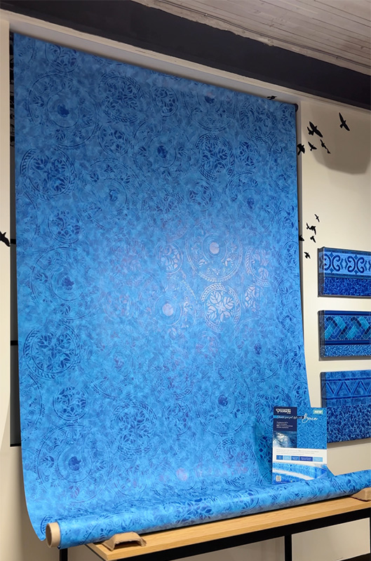 Baia-hanging Large baia vinyl roll handing in the design show case room